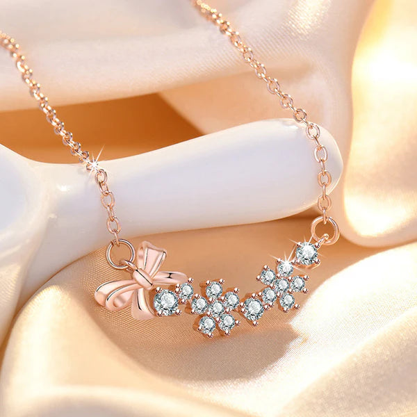Damnstyle Rose Gold-Plated American Diamond Studded Bow-Tie Pendant